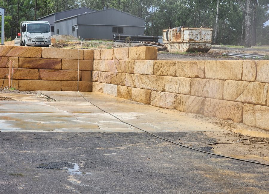 Complex sandstone wall job site